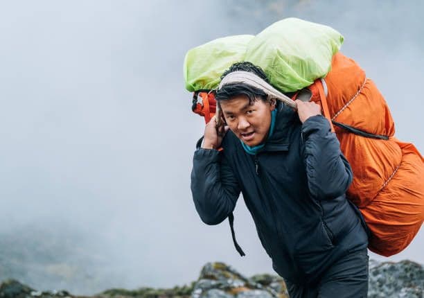 Porter-Carrying-Luggage-During-Nepal-Trekking.jpg